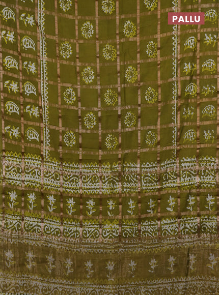 Semi chanderi saree mehendi green and off white with allover zari checks & batik prints and batik printed border