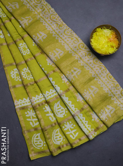 Semi chanderi saree lime yellow and off white with allover zari checks & batik prints and batik printed border