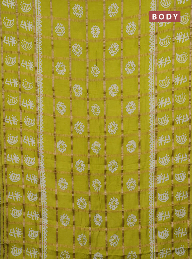 Semi chanderi saree lime yellow and off white with allover zari checks & batik prints and batik printed border