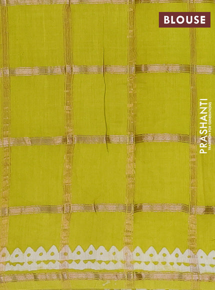 Semi chanderi saree lime yellow and off white with allover zari checks & batik prints and batik printed border