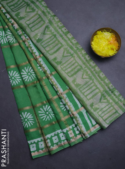 Semi chanderi saree green and off white with allover zari checks & batik prints and batik printed border