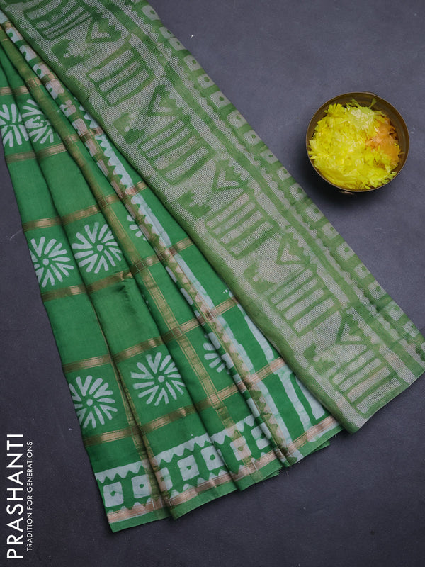 Semi chanderi saree green and off white with allover zari checks & batik prints and batik printed border