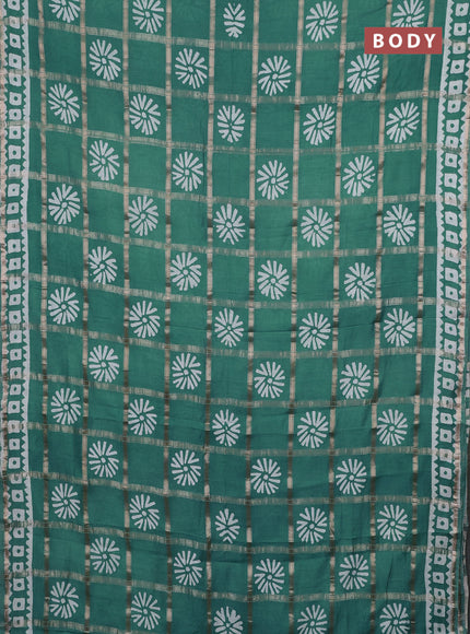 Semi chanderi saree teal green and off white with allover zari checks & batik prints and batik printed border