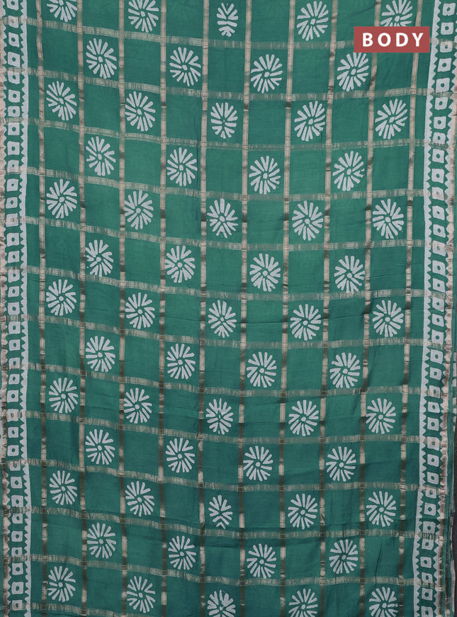 Semi chanderi saree teal green and off white with allover zari checks & batik prints and batik printed border