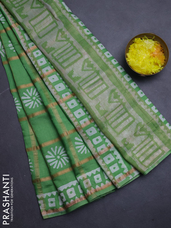 Semi chanderi saree green with allover zari checks & batik prints in borderless style