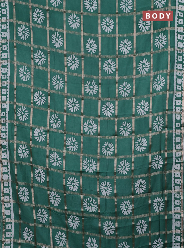 Semi chanderi saree teal green with allover zari checks & batik prints in borderless style