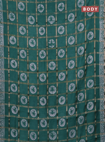 Semi chanderi saree green with allover zari checks & batik prints in borderless style