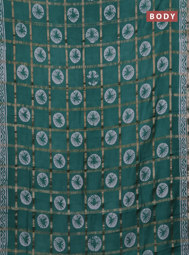 Semi chanderi saree green with allover zari checks & batik prints in borderless style