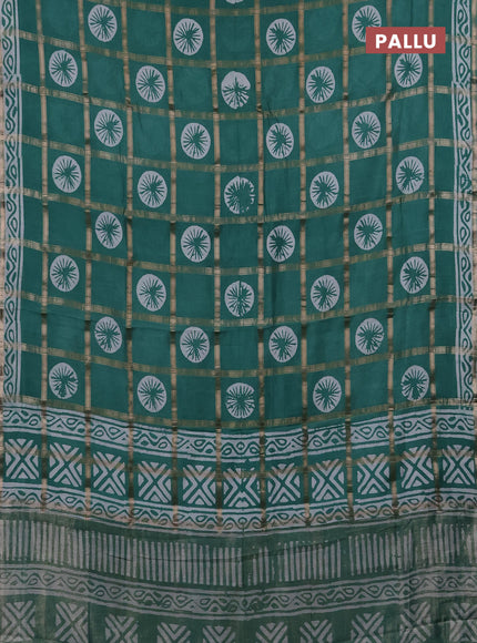 Semi chanderi saree green with allover zari checks & batik prints in borderless style