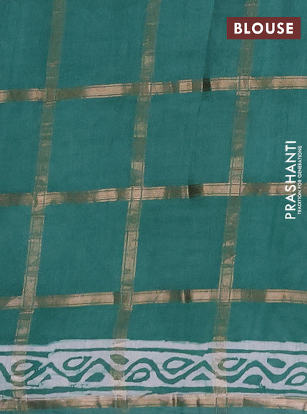 Semi chanderi saree green with allover zari checks & batik prints in borderless style