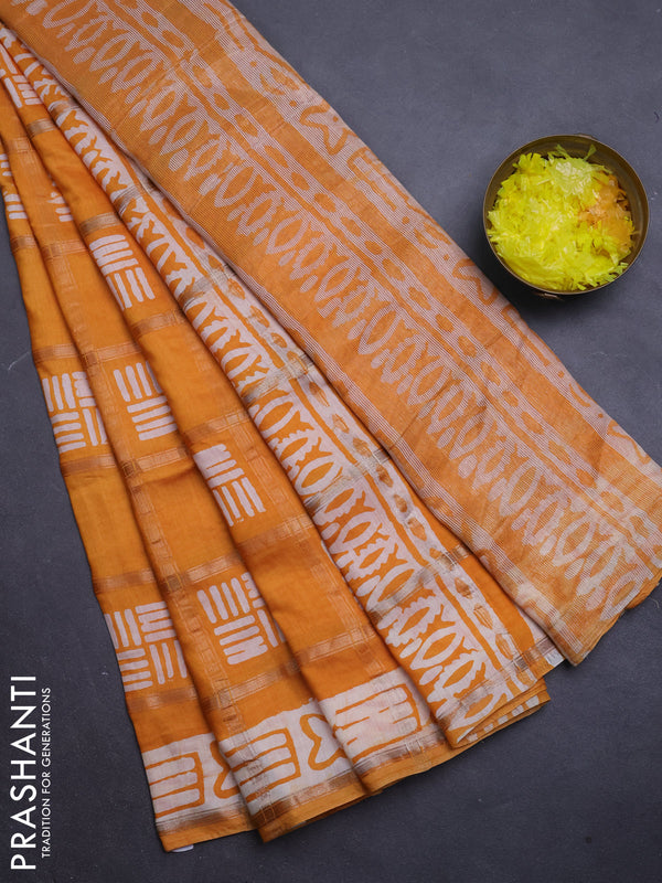 Semi chanderi saree dark mustard with allover zari checks & batik prints in borderless style
