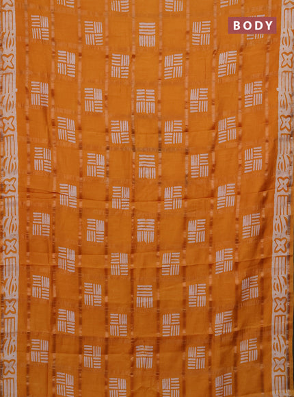 Semi chanderi saree dark mustard with allover zari checks & batik prints in borderless style