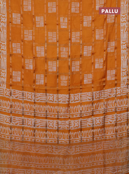 Semi chanderi saree dark mustard with allover zari checks & batik prints in borderless style