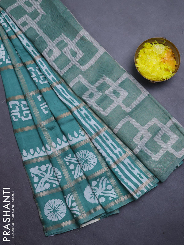 Semi chanderi saree green with allover zari checks & batik prints in borderless style