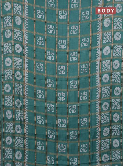Semi chanderi saree green with allover zari checks & batik prints in borderless style