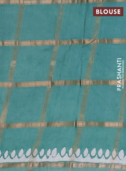 Semi chanderi saree green with allover zari checks & batik prints in borderless style