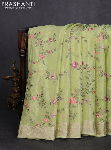 Chiffon saree pista green with allover floral embroidery work and zari woven border