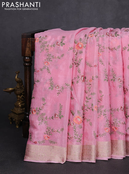 Chiffon saree pink with allover floral embroidery work and zari woven border