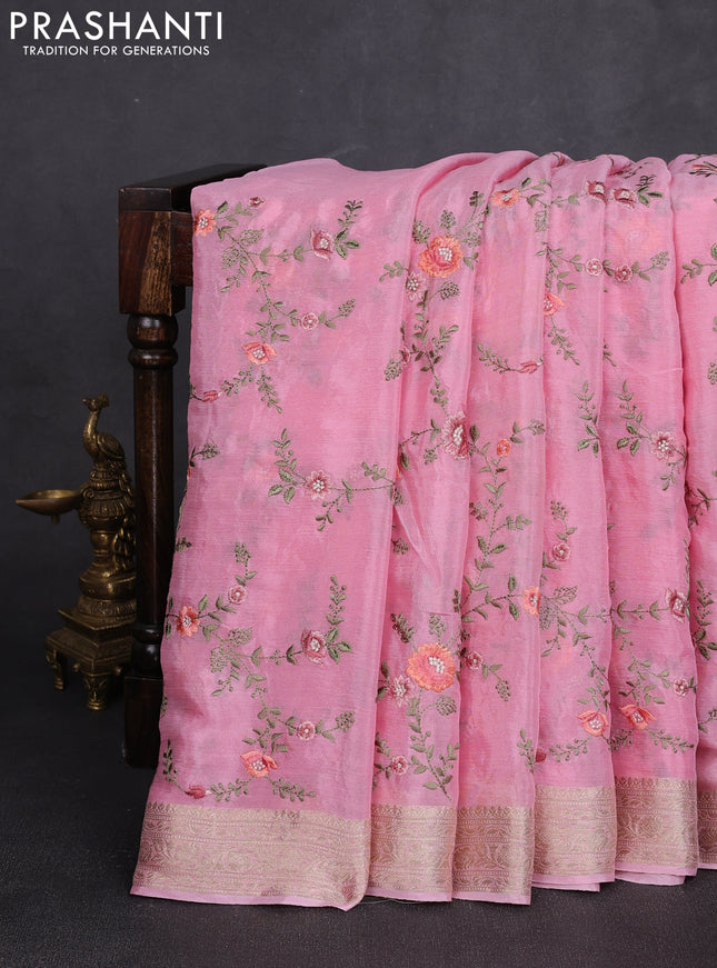 Chiffon saree pink with allover floral embroidery work and zari woven border