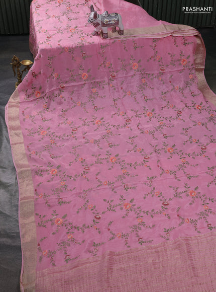 Chiffon saree pink with allover floral embroidery work and zari woven border