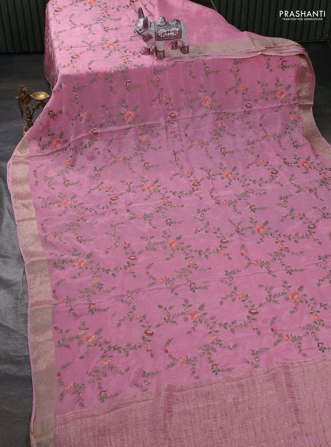 Chiffon saree pink with allover floral embroidery work and zari woven border