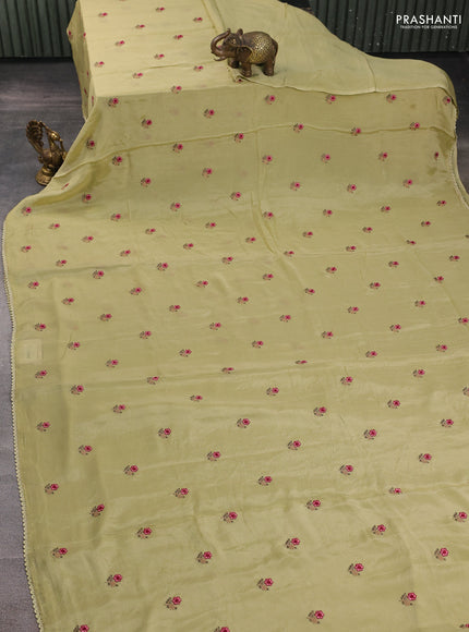 Chiffon saree mild pista green with allover floral embroidery buttas and lace work border