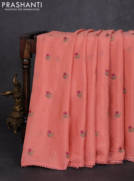 Chiffon saree peach shade with allover floral embroidery buttas and lace work border