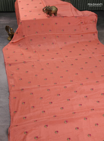 Chiffon saree peach shade with allover floral embroidery buttas and lace work border