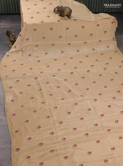 Chiffon saree sandal with allover floral embroidery buttas and lace work border