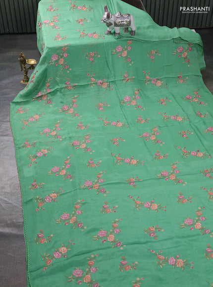 Chiffon saree green shade with allover floral embroidery work and zari woven border