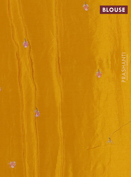 Chiffon saree mustard yellow with allover floral embroidery work and zari woven border
