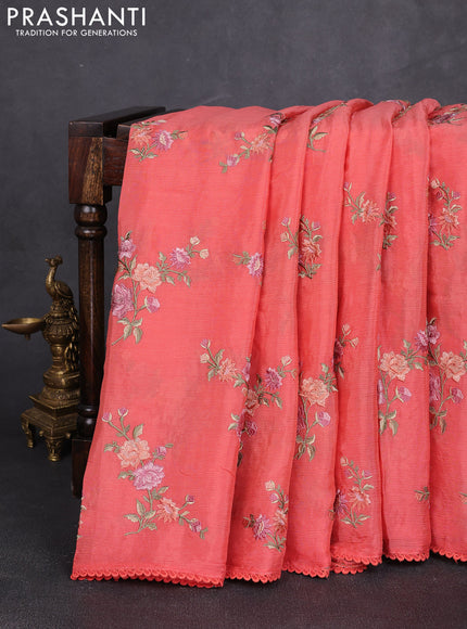 Chiffon saree peach orange with allover floral embroidery work and zari woven border