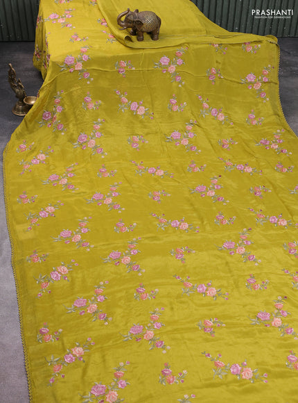 Chiffon saree lime green with allover floral embroidery work and zari woven border