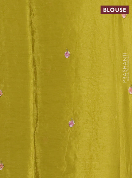 Chiffon saree lime green with allover floral embroidery work and zari woven border