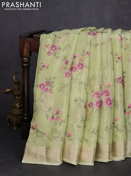 Chiffon saree pista green with allover floral embroidery work and zari woven border