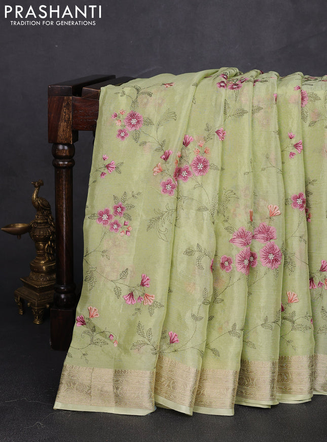 Chiffon saree pista green with allover floral embroidery work and zari woven border