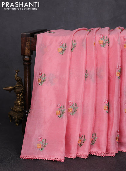 Chiffon saree peach pink with allover floral embroidery work and zari woven border
