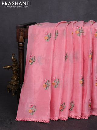 Chiffon saree peach pink with allover floral embroidery work and zari woven border