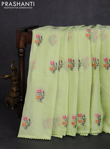 Chiffon saree pista green with allover floral embroidery work and zari woven border