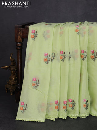 Chiffon saree pista green with allover floral embroidery work and zari woven border