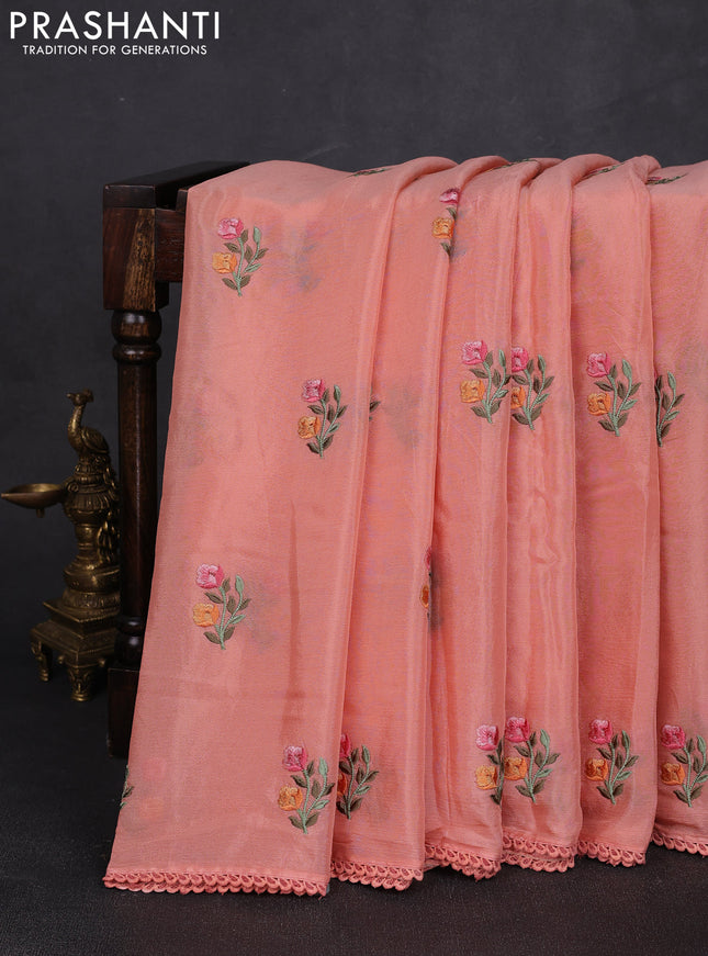 Chiffon saree peach with allover floral embroidery work and zari woven border