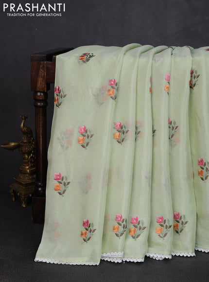 Chiffon saree pista green with allover floral embroidery work and zari woven border