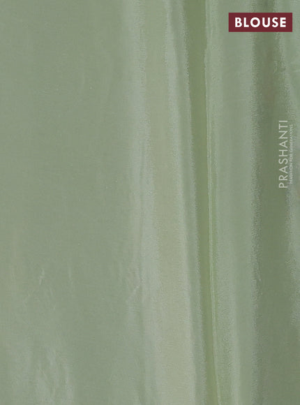 Chiffon saree pista green with allover floral embroidery work and zari woven border