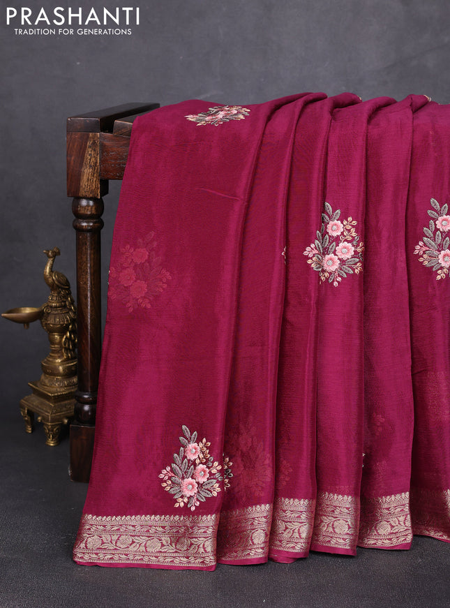 Chiffon saree wine shade with floral embroidery work and zari woven border