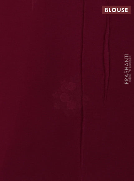 Chiffon saree wine shade with floral embroidery work and zari woven border
