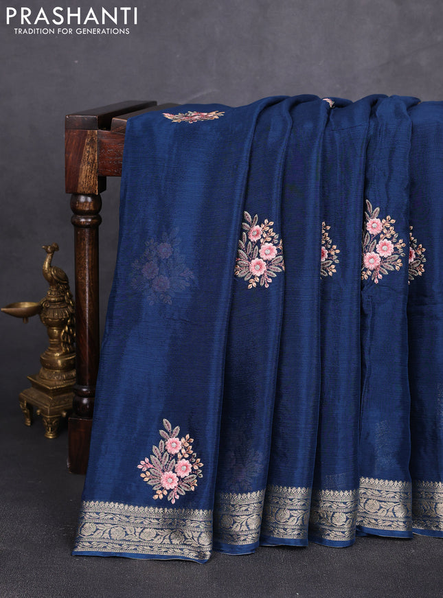 Chiffon saree peacock blue with floral embroidery work and zari woven border