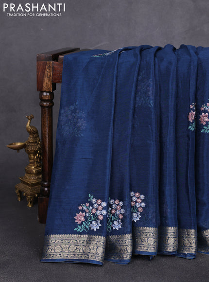 Chiffon saree peacock blue with floral embroidery work and zari woven border