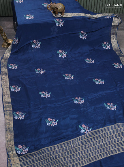 Chiffon saree peacock blue with floral embroidery work and zari woven border