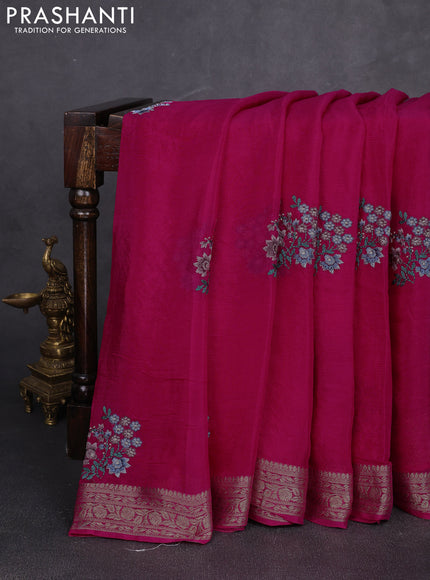 Chiffon saree rani pink with floral embroidery work and zari woven border