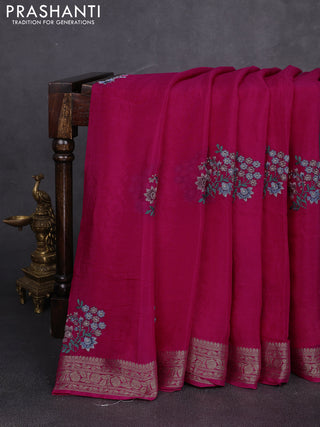 Chiffon saree rani pink with floral embroidery work and zari woven border